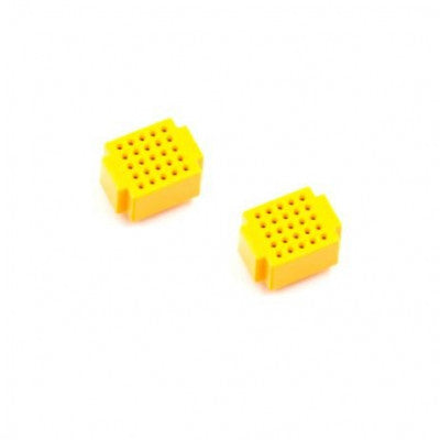 The pack of two XF-25 Ultra Mini Breadboards in yellow.