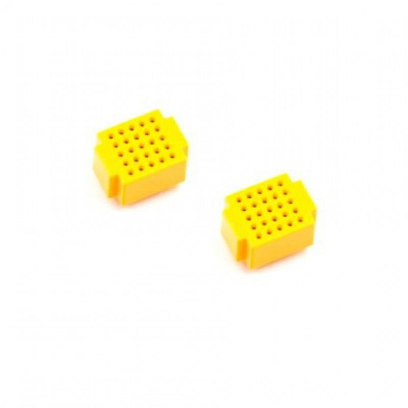 The pack of two XF-25 Ultra Mini Breadboards in yellow.