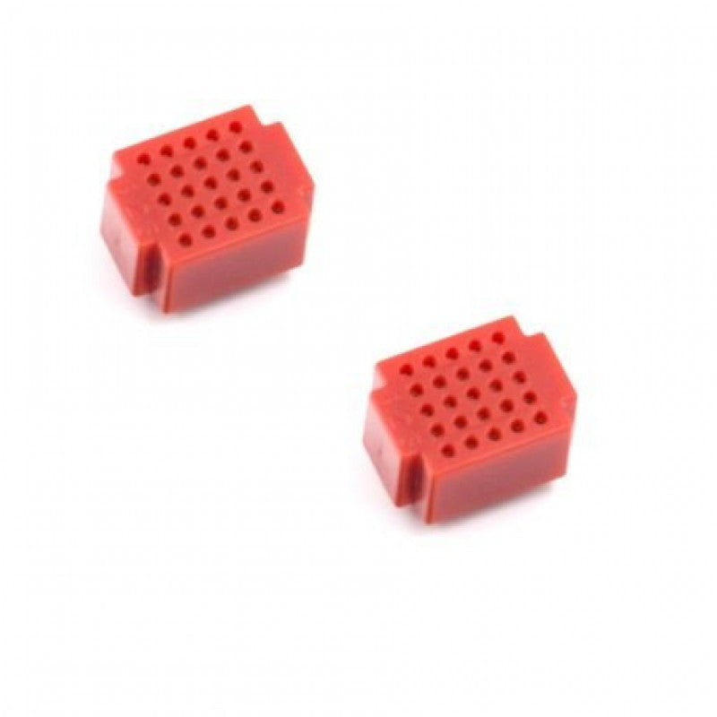 A pack of two XF-25 Ultra Mini Breadboards in red.